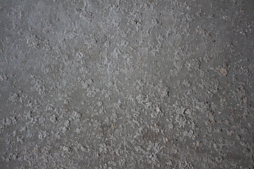 Concrete background with a shallow fraction of rubble 