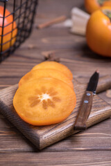 sliced orange on cutting board