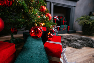 new year cozy home interior with christmas tree and garlands