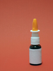 Large unnamed nasal spray on red background