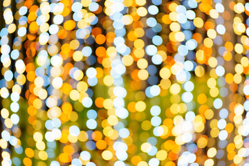 Abstract bokeh from colorful lights at night.