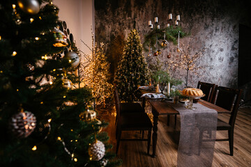 new year cozy home interior with christmas tree and garlands