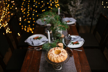 new year cozy home interior with christmas tree and garlands