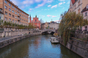 Fototapeta premium Ljubljana/ Slovenia-October 11th, 2018: Beautiful, old Ljubljana city streets with people outdoors enjoying festivals and open markets before corona virus epidemic