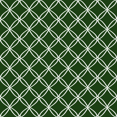 White seamless pattern on a green background. Vector illustration.