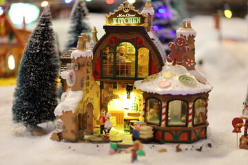 Miniature of Christmas scene old house in snow with winter concept, street, outdoor Christmas holidays