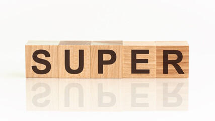 Wooden Blocks with the text: super. The text is written in black letters and is reflected in the...