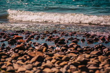 textures pebble stones on the coast