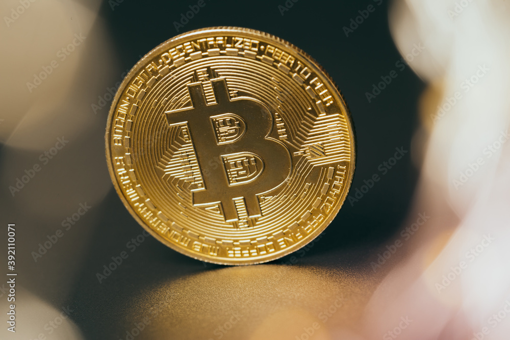 Wall mural bitcoins and new virtual money. gold coin with b.mining icon or blockchain technology