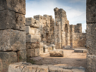 view to old ruins of antique basilica through door enter