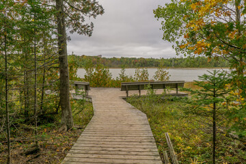 To the grotto, a natural wonder in Bruce Peninsula National Park. This park is protecting a rugged shore of the Lake Huron with turquoise blue waters