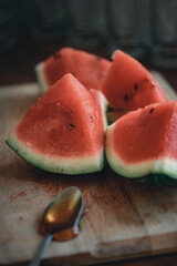 Bright red fresh watermelon slices with honey top view.