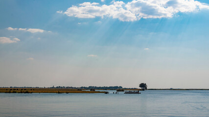 rays and clouds over the river