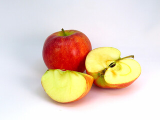 Apple slices and whole apple.