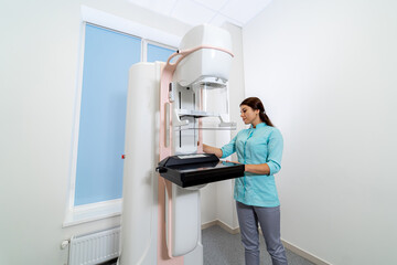 X - ray mammograph. Medical equipment in modern clinic. Doctor near apparatus. Closeup.