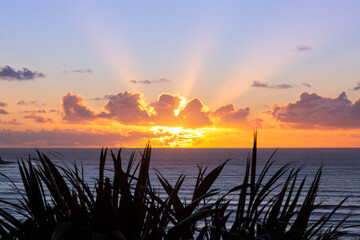 Amazing sunset on the ocean. Sea view from the coast at sunset time. Concept about lifestyle, holiday and travel. 