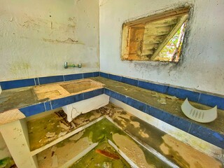 Abandoned hotel or a resort by the ocean