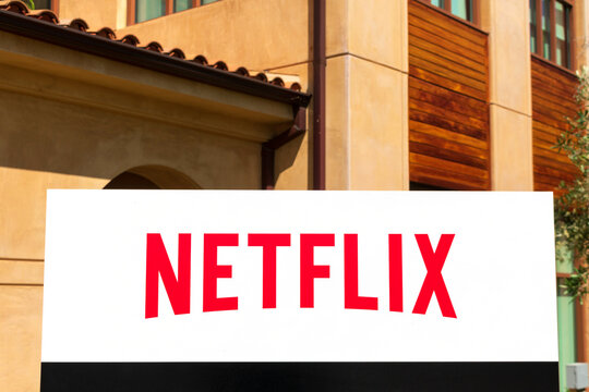Netflix sign at company headquarters in Silicon Valley. Netflix, Inc. is an American media-services provider and production company - Los Gatos, California, USA - 2020