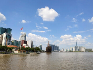 Naklejka premium River in Ho Chi Minh City (Saigon) and Skyscrapers in the business district .Vietnam. South-East Asia. 