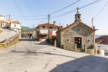 a street in Vila Marim town and the Chapel of the Martyr Saint Sebastian, municipality of Mesao Frio, Vila Real district, Douro, Portugal