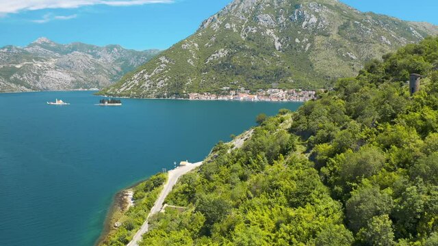 Perast, Montenegro. Aerial panoramic view of the beautiful seascape and mountains. Was filmed at summer day 