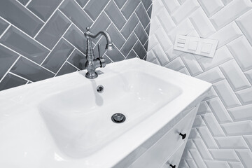 Close uo image of the white sink in the bathroom.