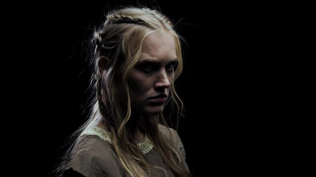 Angry young woman with blonde hair is looking, medieval clothes, 4k