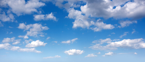 Panorama of afternoon blue sky with white clouds. - obrazy, fototapety, plakaty