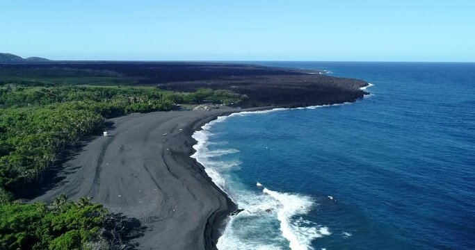 Forward tracking Aerial view of Pohoiki Black Sand Beach,Big Island,Hawaii,usa