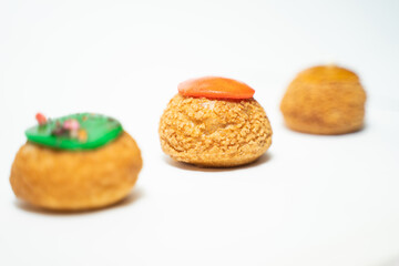 color profitroles isolated on the white background