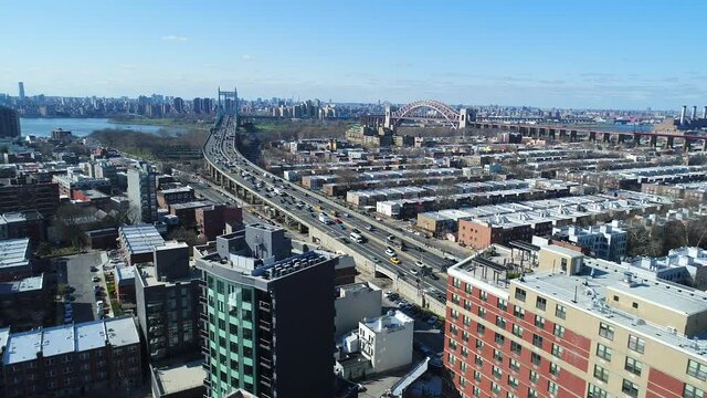 Far Away View of RFK and Hell Gate Bridge - Reverse Pull Away Shot