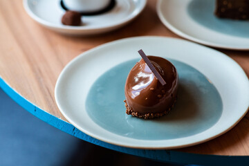 Delicious dessert in a blue plate in a cafe