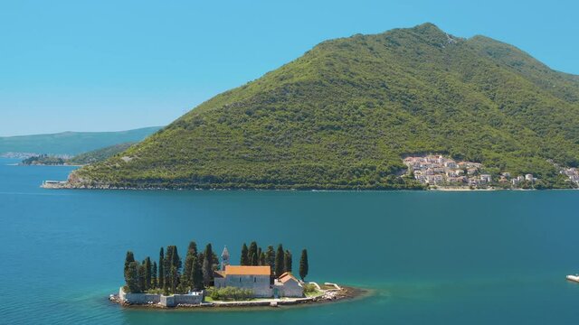 Perast, Bay of Kotor, Montenegro. Aerial view of the Our Lady of the Rocks. The island Saint George on the background