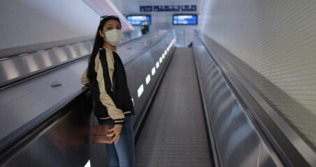 You have to wear face masks on the platform of a railway station - urban photography