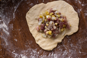 woman cooking traditional tatarian dish echpochmak © DAWT_PHOTO