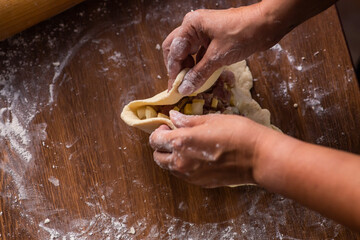 woman cooking traditional tatarian dish echpochmak © DAWT_PHOTO