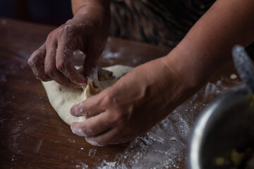 woman cooking traditional tatarian dish echpochmak © DAWT_PHOTO