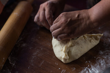 woman cooking traditional tatarian dish echpochmak