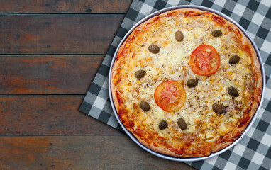 mozzarella pizza with corn, olives and tomatoes