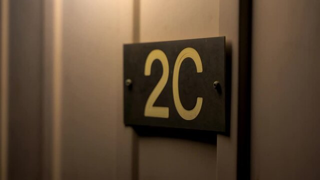 2C House Number on Townhouse at night.