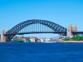 Panoramic Aerial views of Sydney Harbour with the bridge, CBD, North Sydney, Barangaroo, Lavender Bay and boats in view