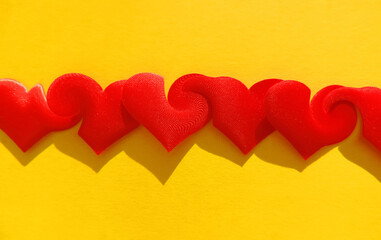 red hearts on yellow background with weave and merge effect,  greeting valentine heart shape,...
