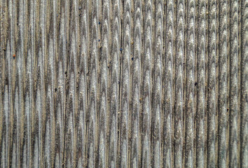 unusual radial pattern on an old ribbed board, photographed close-up. wood abstract background