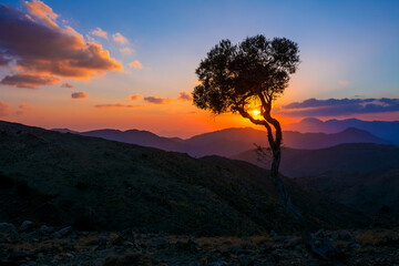 Fototapeta na wymiar mountain sunset with dramatic clouds