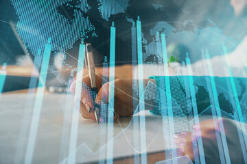 Double exposure of forex chart drawing over people taking notes background. Concept of financial...