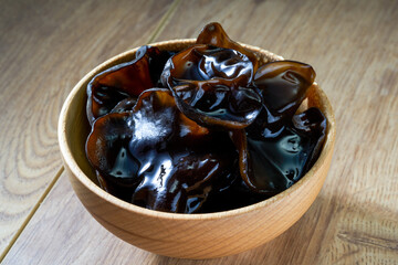 Close-up of a bowl of moist black fungus