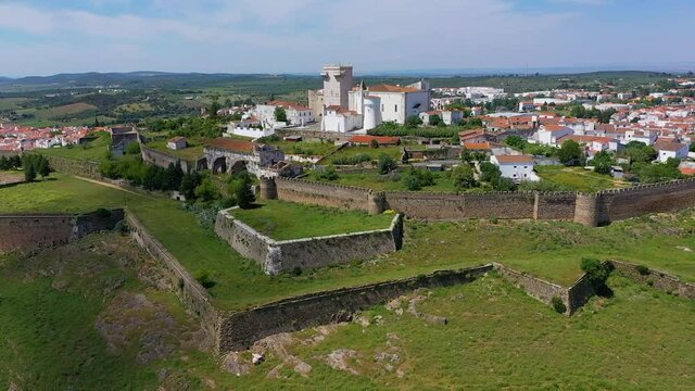 Aerial view of fortified village on hill in Portugal.