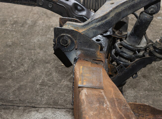 Car Lower Arm and Crack Car Chassis or Car Frame and Shock Absorber