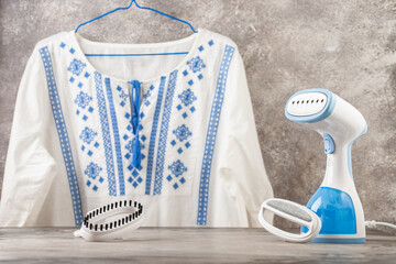 Portable home and travel garment steamer for clothes. Housework