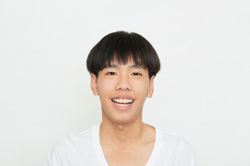 Young Man Smiling Happy on white